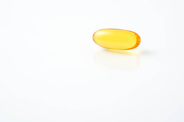 istock Softgel capsules 3D, fish oil, supplement on with background 2163100420