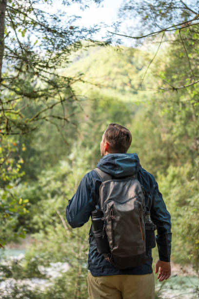 istock Male Hiker Enjoying Nature Walk 2163106139