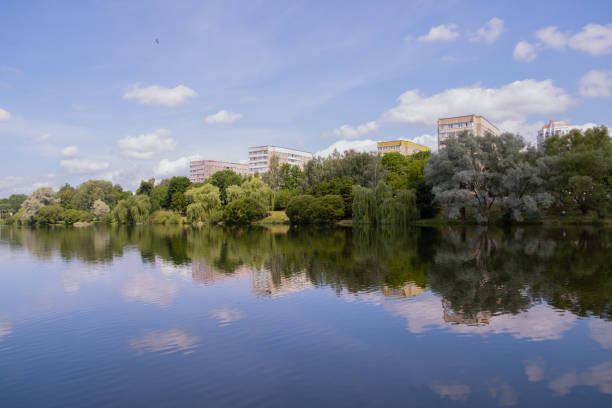 istock sunny day, bright green embankment. 2163107862