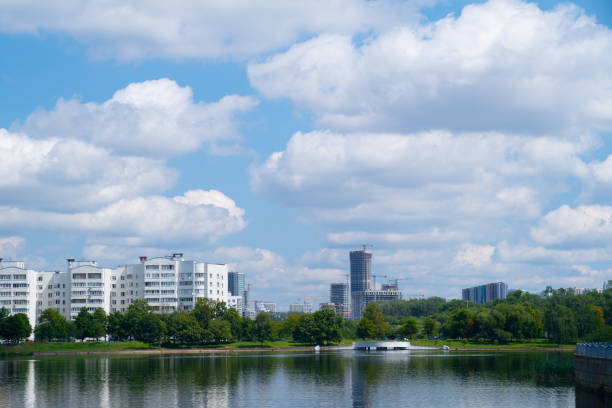 istock a megalopolis under construction, an embankment with trees. 2163107863