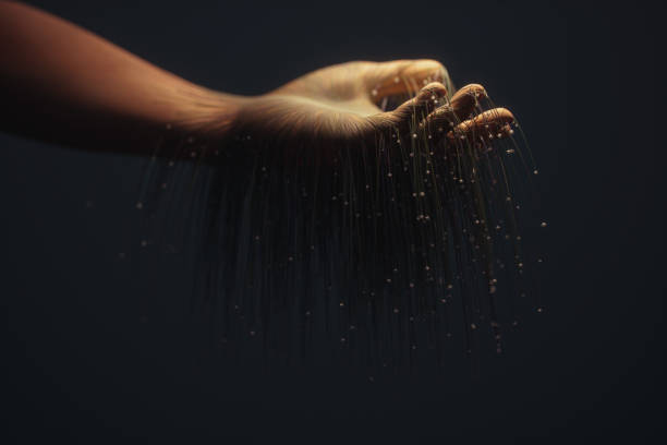 Human hand with abstract cables.