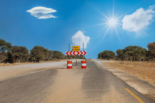 istock sign road closed on a tarred road, closed for traffic 2163110325