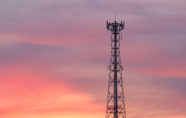 istock Telephone tower on evening cloud and twilight sky background. 2163113412