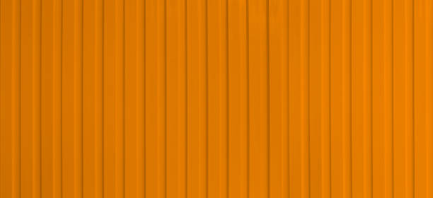 istock Wide surface of the orange aluminum wall. 2163114011