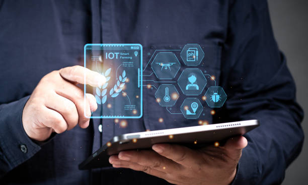 istock Man point the IoT Smart farm on the tablet virtual screen. Application for farmer innovation to check and control for farming growth harvest online. AI, artificial intelligence systems management. 2163117340