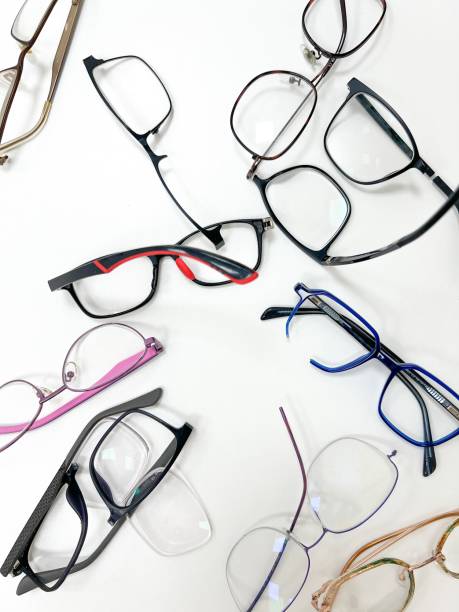 istock Assortment of broken optical eyeglasses, broken hinges, missing lenses 2163120563