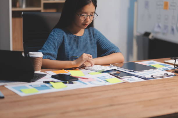 istock The designer team is designing the uxui system to make the uxui system work well on new phones and support system updates. Website development concept UI UX front end designer 2163124023
