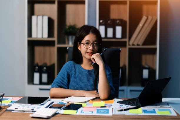 istock The designer team is designing the uxui system to make the uxui system work well on new phones and support system updates. Website development concept UI UX front end designer 2163124257