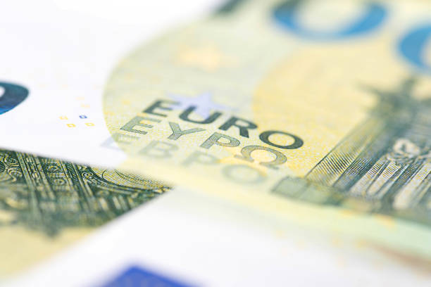 Close-up of many euro banknotes