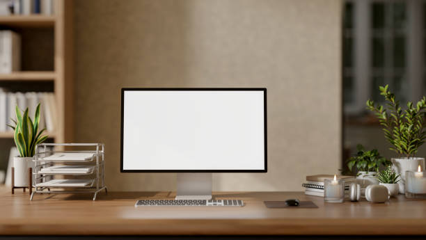 istock A cozy, contemporary home office or private office featuring a computer mockup on a wooden desk. 2163131504