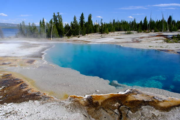 istock beautiful large blue hot spring, called Black Pool, at West Thumb Geyser Basin in Yellowstone National Park, Wyoming, USA 2163135355