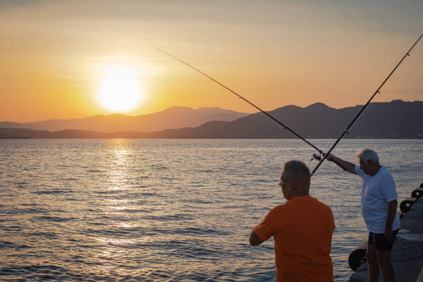istock Two men are fishing with a hook 2163138595