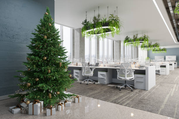 istock Eco-Friendly Open Plan Office With Christmas Tree, Ornaments And Gift Boxes 2163138747