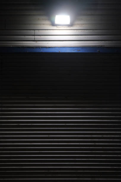 Flood light on commercial building at night
