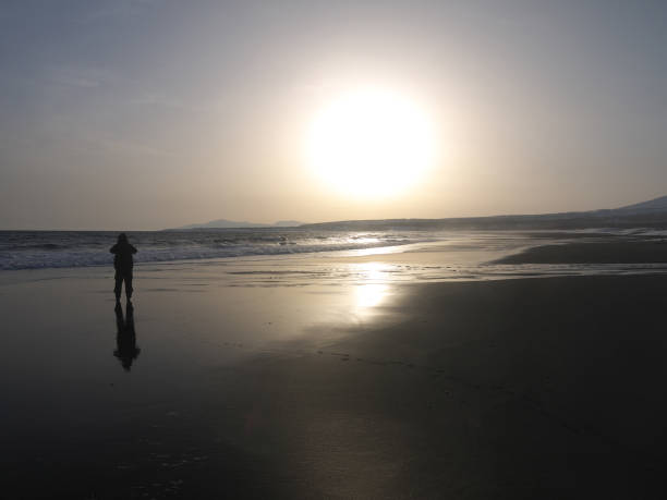 istock Taking Sunset pictures on northern sea shore 2163140757