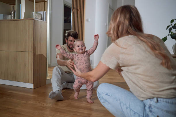 istock First steps of our baby 2163147604