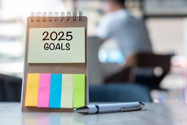 istock 2025 Goal word on note paper with pen on wooden table. Resolution, strategy, solution, goal, business, New Year New You and happy holiday concepts 2163150897
