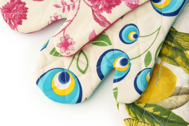 istock Colorful Printed Oven Mitts Isolated on White Background 2163155237