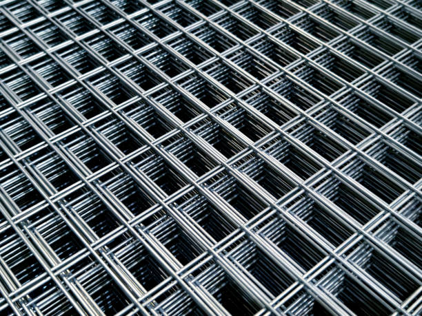 istock Steel chain link fence wire mesh texture and pattern 2163157909