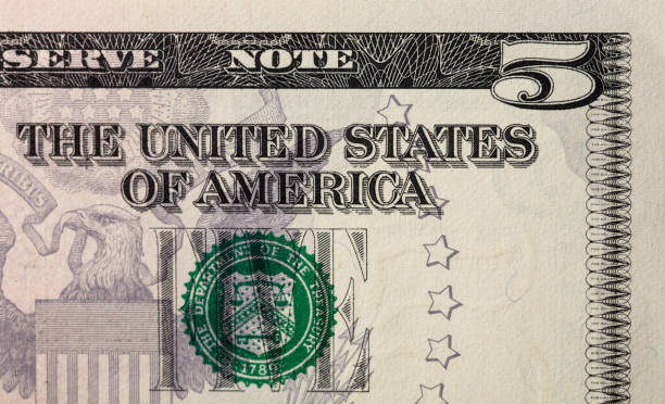 istock Details of a five dollar bill. Background 2163160124
