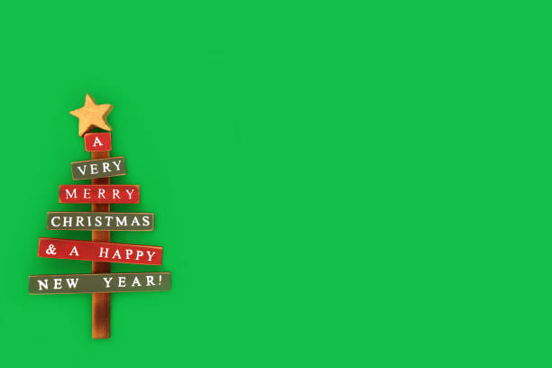 Vintage Christmas tree festive bauble decoration background on green background. Old fashioned wooden ornament design for greeting card, gift tag, invitation.