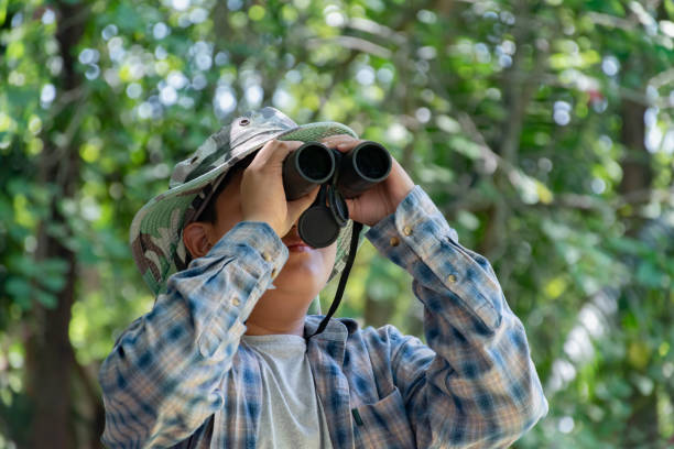 istock Asian boys with birdwatching activity 2163161323