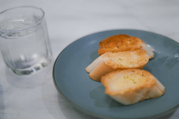 Toasted garlic bread on a plate