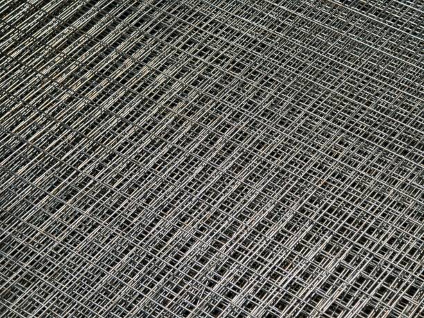 istock Steel chain link fence wire mesh texture and pattern 2163162908