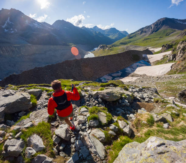 istock Mountaineer on Mountain Path with Valley View 2163163853