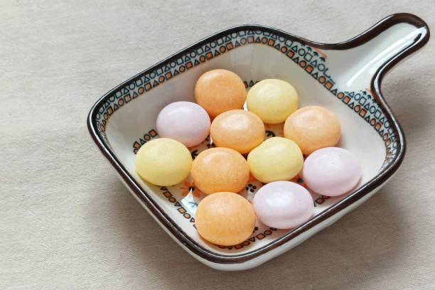 istock Colorful sweet candy in container 2163164550