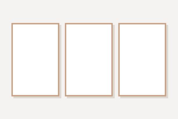 three simple frames gallery wall - triptychům fotky stock ilustrace