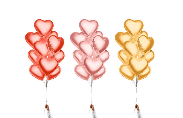 istock Hand holding blank colored heart balloon bouquet mockup, isolated 2163170968