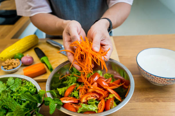 istock Chef at the kitchen preparing spicy glass noodle salad 2163174390