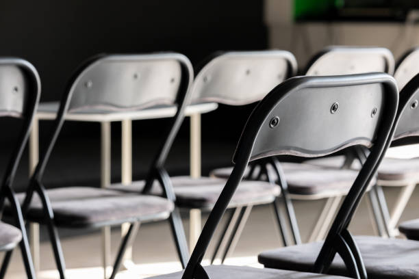 istock Chairs in a conference room. Close-up, selective focus. 2163174571