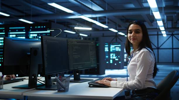 istock Portrait of smiling engineer overseeing data center 2163175076