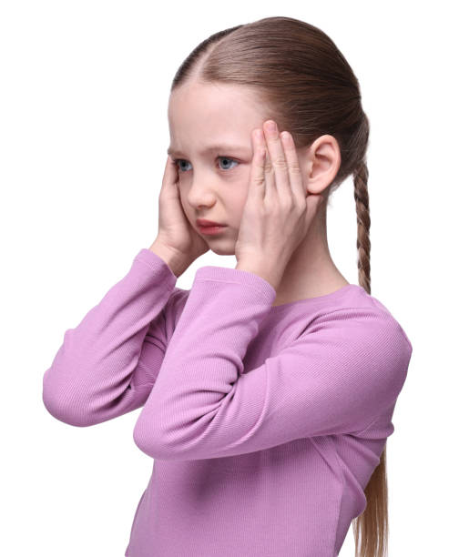 istock Little girl suffering from headache on white background 2163176760