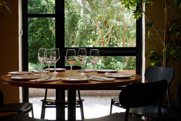istock Restaurant table with outside garden 2163178516