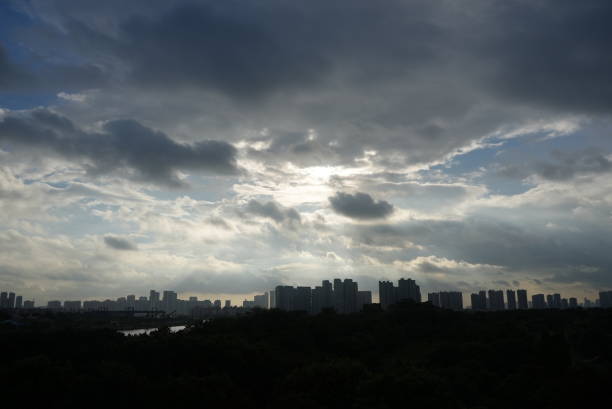Dark clouds gathering over the city  on summer day.