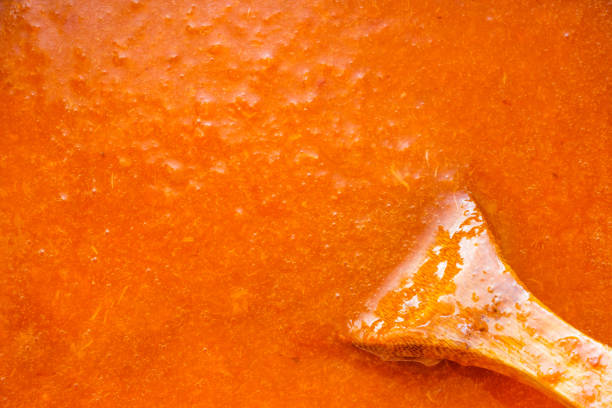 istock Apricot jam with wooden spoon 2163181204