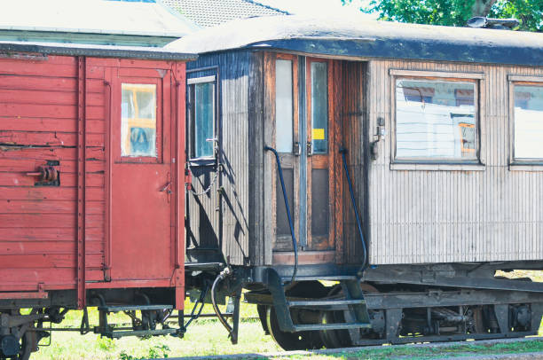 A close-up of old train carriages
