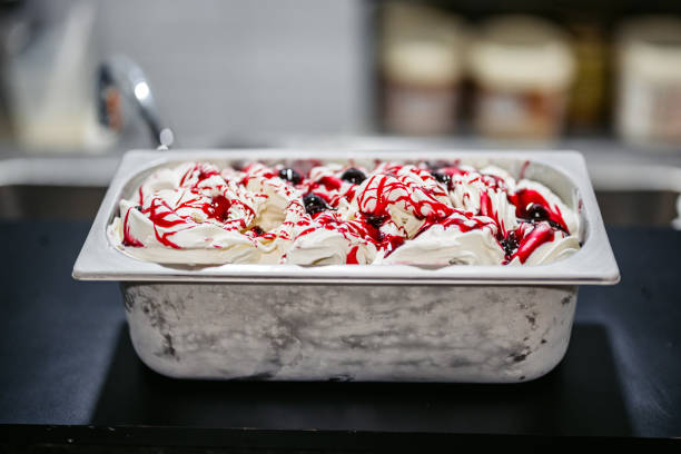 Freshly Made Cherry Ice Cream On The Table In An Ice Cream Shop