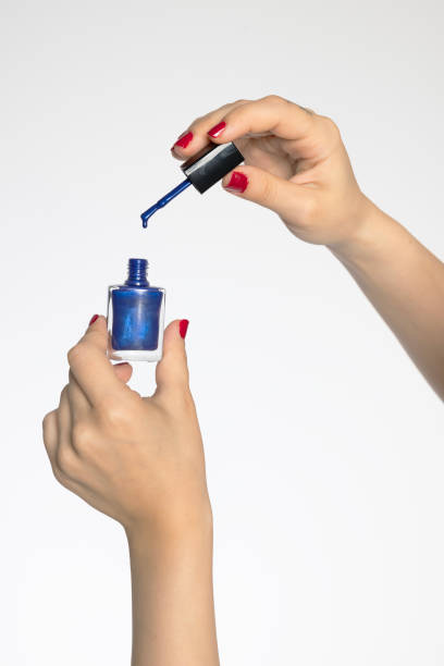 Woman manicuring her nails, Close-up