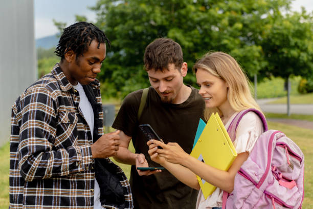 istock multiracial group of students on campus 2163188425