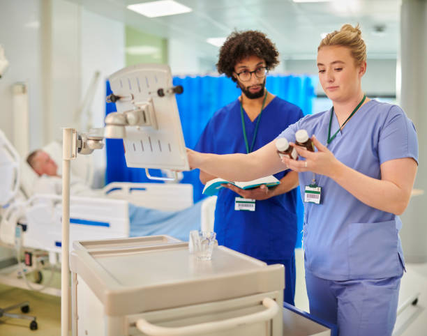 istock medical student with mentor prescribing ward medicines 2163190230