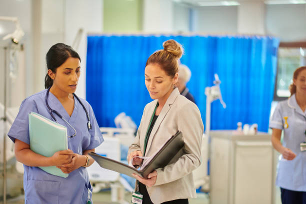istock hospital consultant chatting to administrator 2163190560
