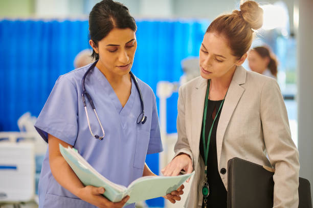 istock hospital consultant chatting to administrator 2163190867
