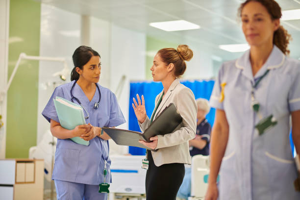 istock hospital consultant chatting to administrator 2163190948