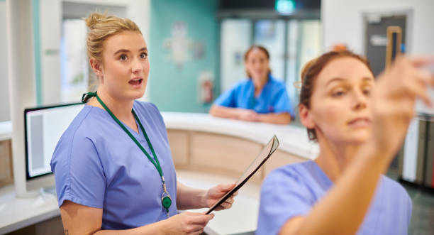 istock student nurse in nursing station 2163191003
