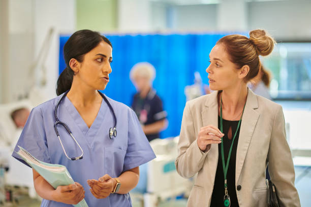 istock hospital consultant chatting to administrator 2163192315