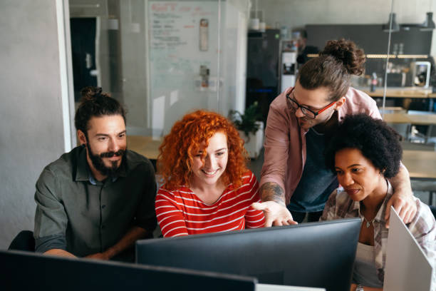 istock Team of programmers writing digital code in the metaverse and working together on the internet 2163196934